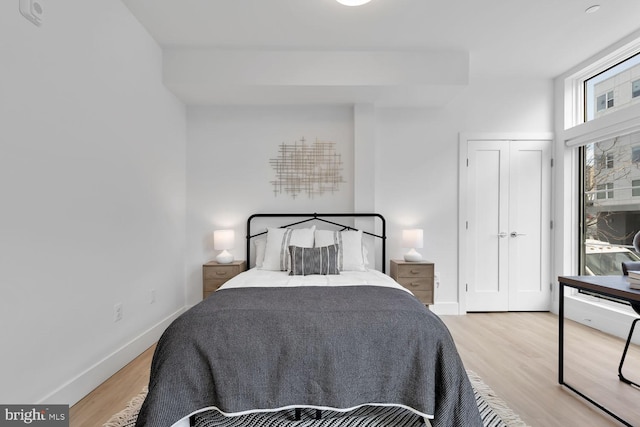 bedroom featuring light wood-type flooring