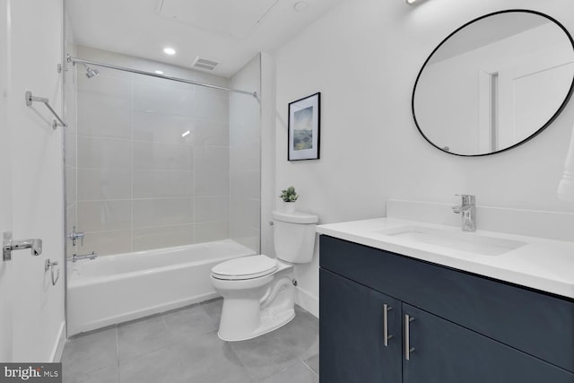 full bathroom with vanity, tiled shower / bath combo, and toilet