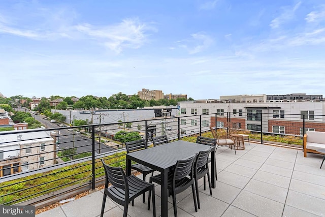 view of patio / terrace with a balcony