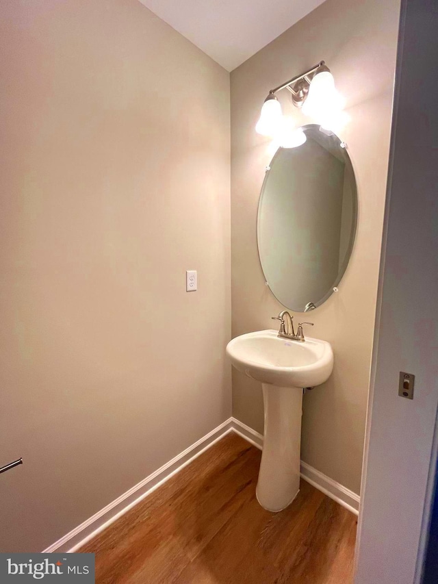 bathroom featuring hardwood / wood-style flooring