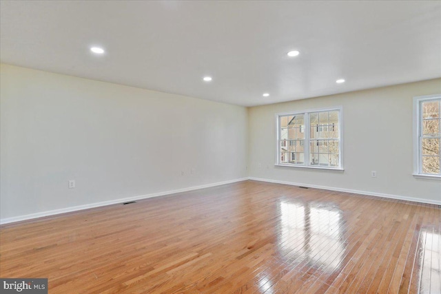 empty room with light wood-type flooring