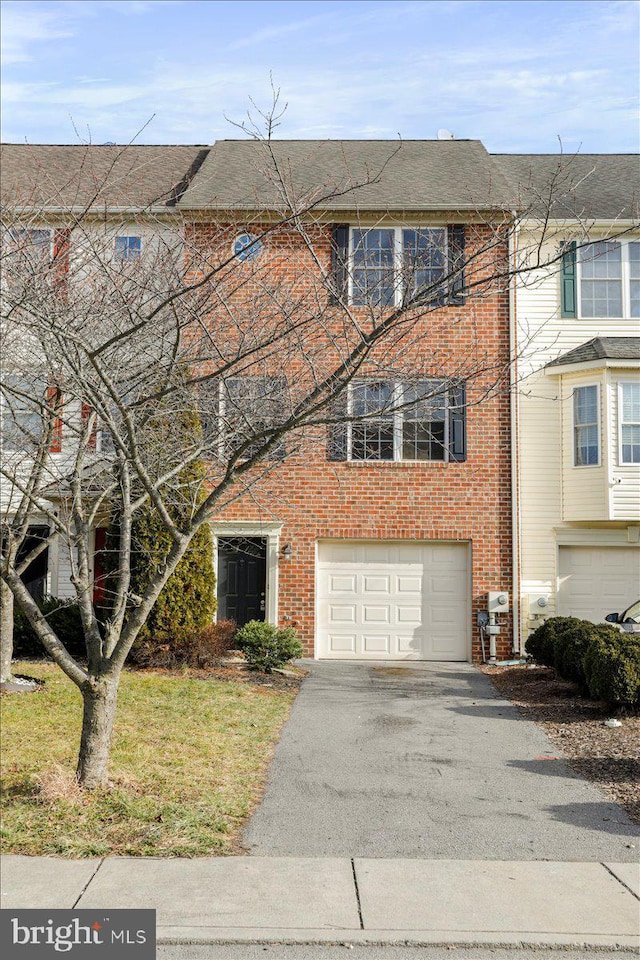 view of property featuring a garage