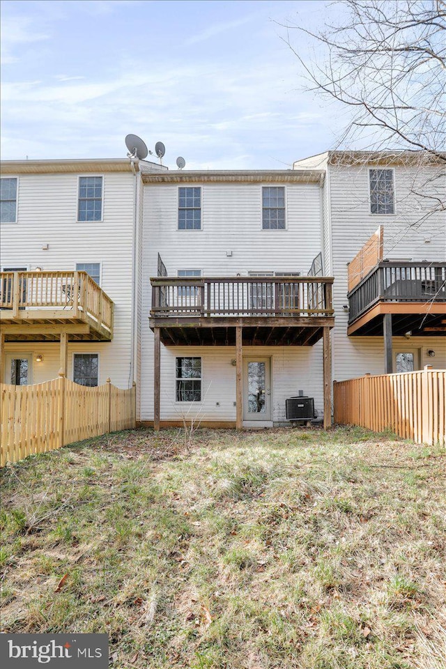 rear view of property with central air condition unit