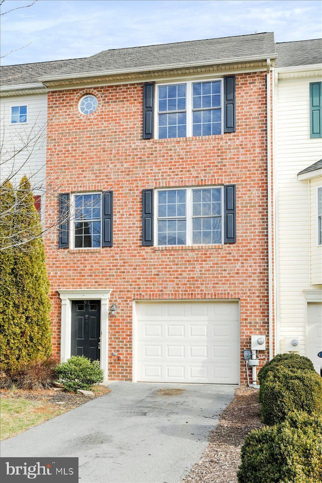 view of property featuring a garage