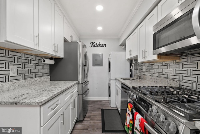 kitchen featuring stainless steel appliances, white cabinetry, dark wood-type flooring, and sink