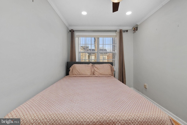 bedroom featuring ceiling fan and ornamental molding