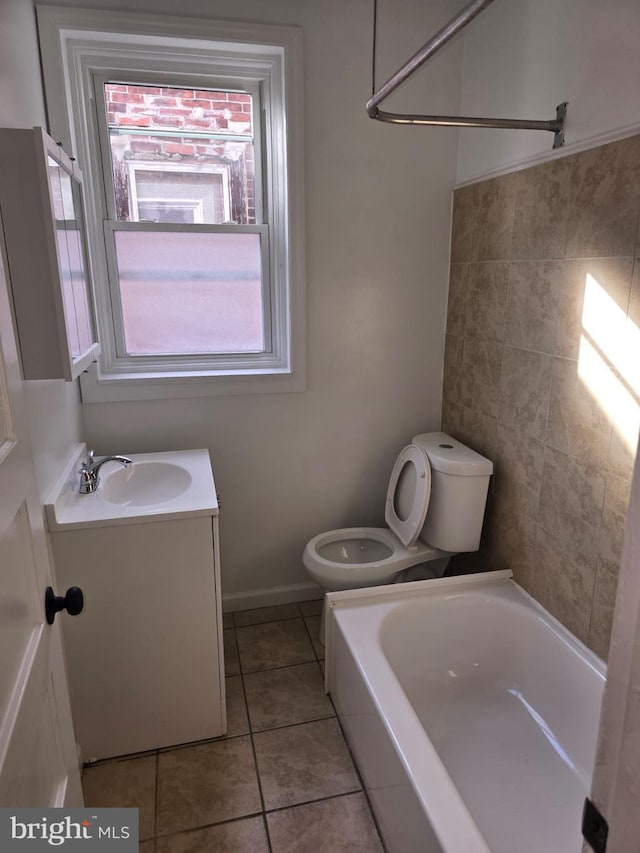 full bathroom featuring tile patterned flooring, vanity, shower / bath combination, and toilet