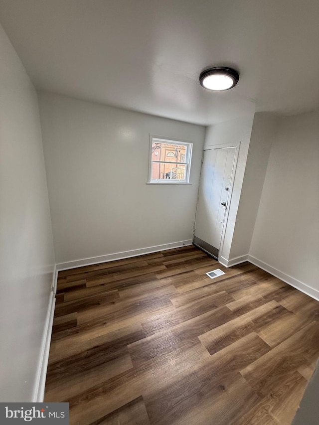 interior space featuring dark wood-type flooring