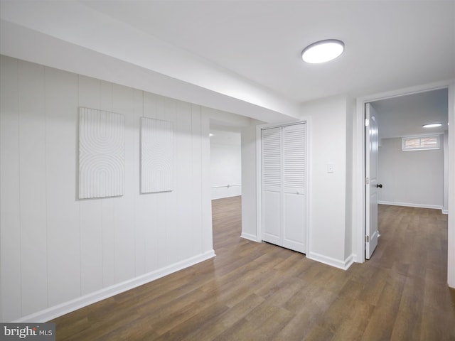 basement featuring dark wood-type flooring