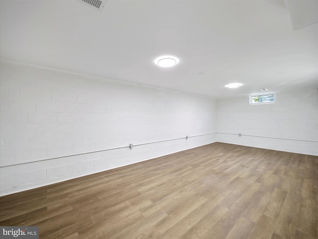 unfurnished room featuring hardwood / wood-style flooring