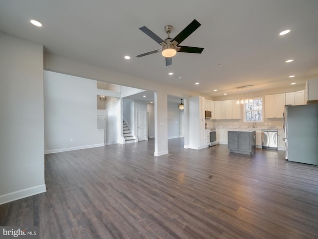 12544 Woodsboro Pike, Keymar, MD 21757 - unfurnished living room featuring ceiling fan, sink, and dark hardwood / wood-style floors