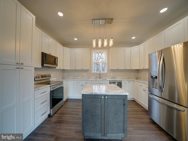 12544 Woodsboro Pike, Keymar, MD 21757 - kitchen featuring dark hardwood / wood-style flooring, stainless steel appliances, pendant lighting, a center island, and white cabinetry