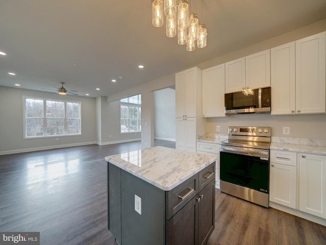 12544 Woodsboro Pike, Keymar, MD 21757 - kitchen featuring white cabinetry, ceiling fan, and appliances with stainless steel finishes