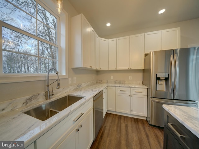12544 Woodsboro Pike, Keymar, MD 21757 - kitchen with light stone counters, stainless steel appliances, dark wood-type flooring, sink, and white cabinets
