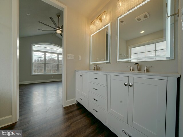 12544 Woodsboro Pike, Keymar, MD 21757 - bathroom featuring vanity, ceiling fan, wood-type flooring, and lofted ceiling