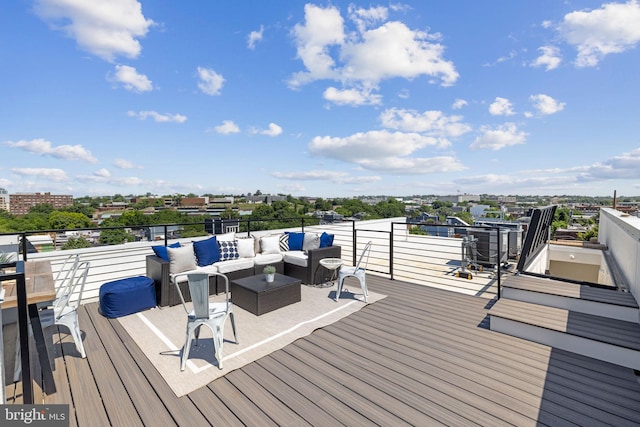 wooden deck with an outdoor hangout area