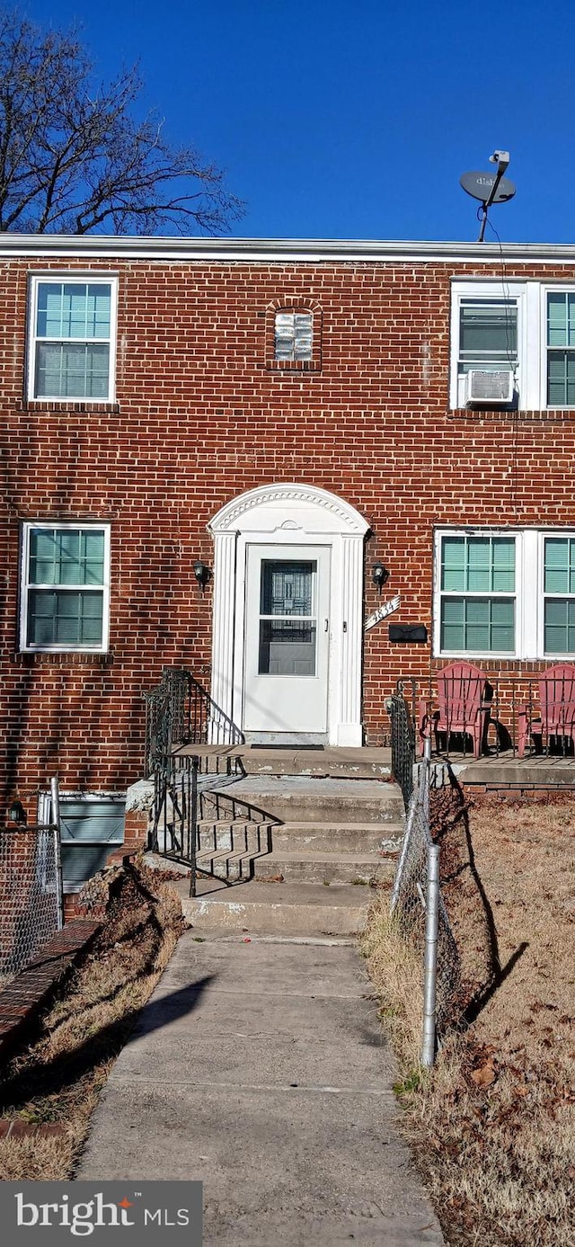 property entrance featuring cooling unit