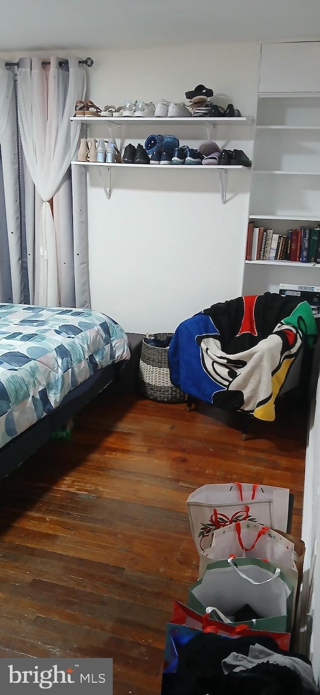 bedroom featuring dark hardwood / wood-style floors