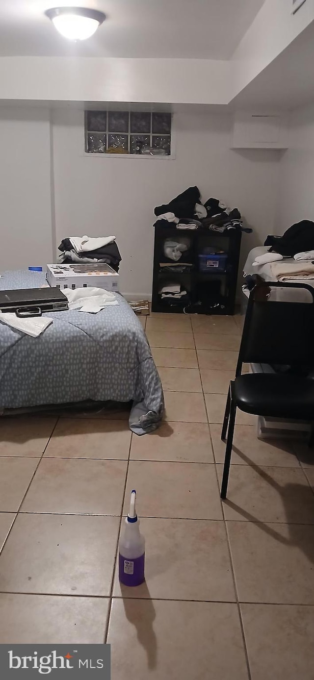 bedroom featuring tile patterned floors