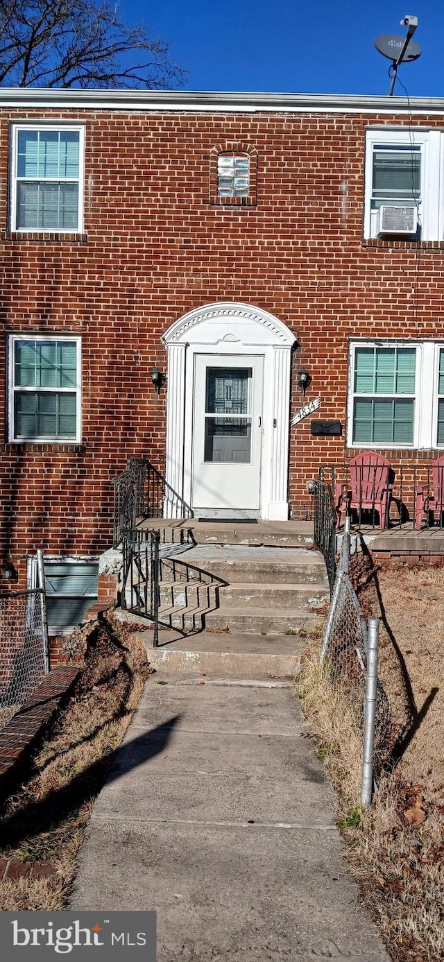 property entrance with cooling unit