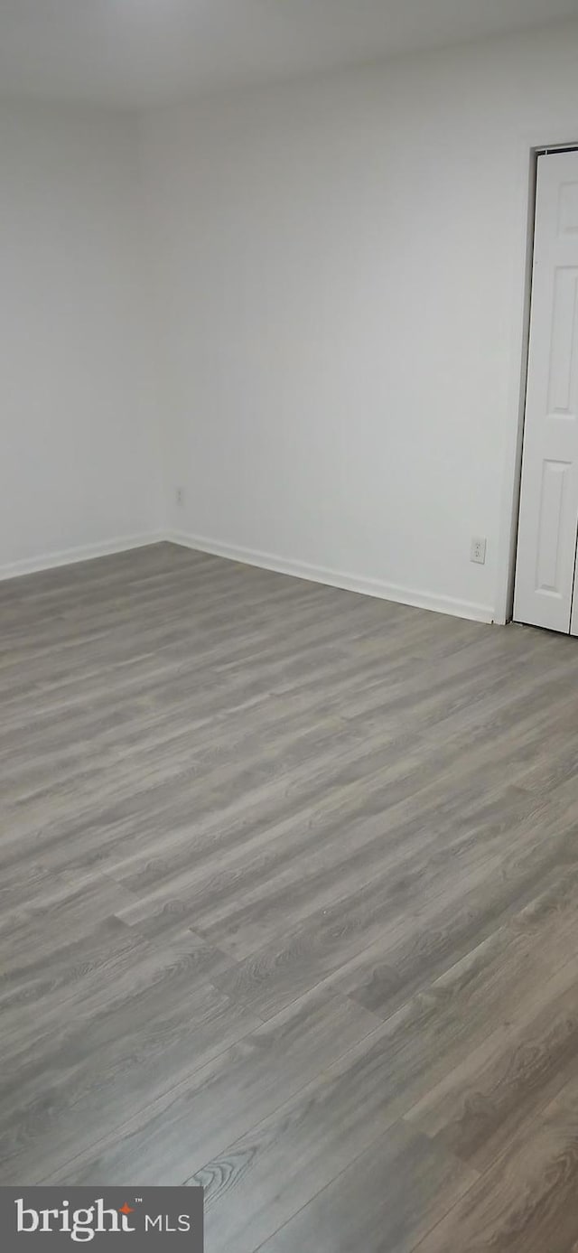 empty room with light wood-type flooring