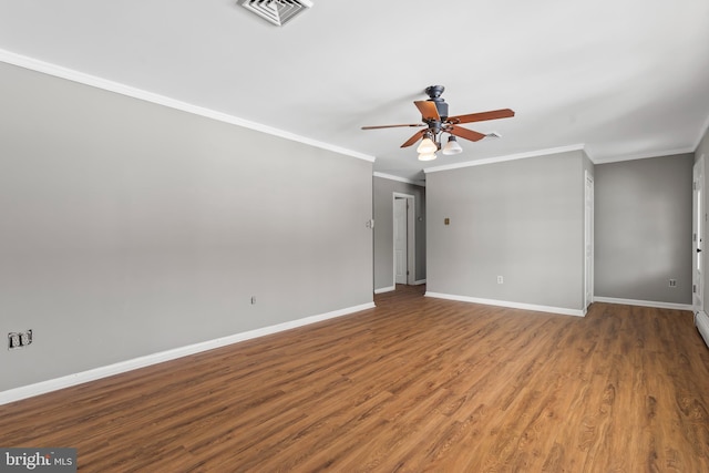 unfurnished room with ornamental molding, wood-type flooring, and ceiling fan