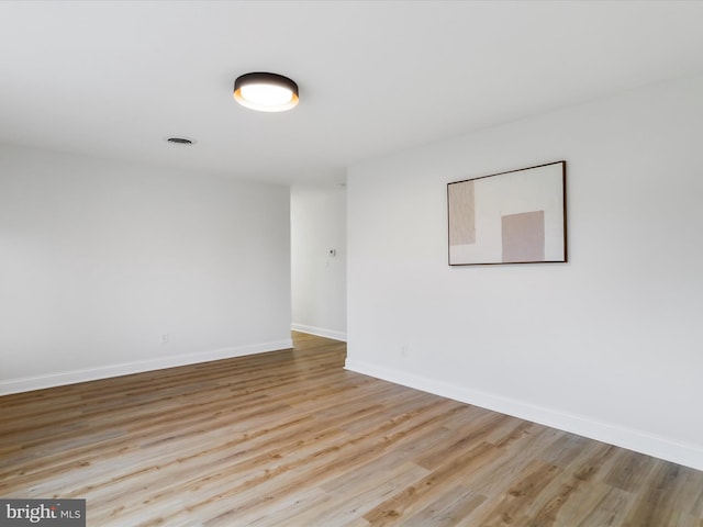 empty room with light wood-type flooring