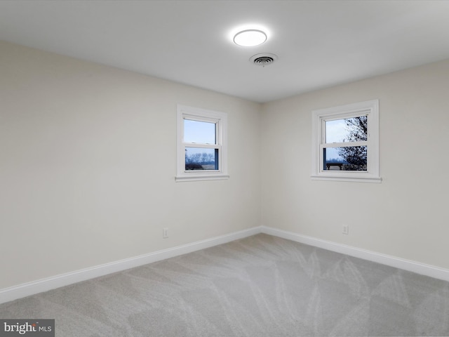 view of carpeted spare room