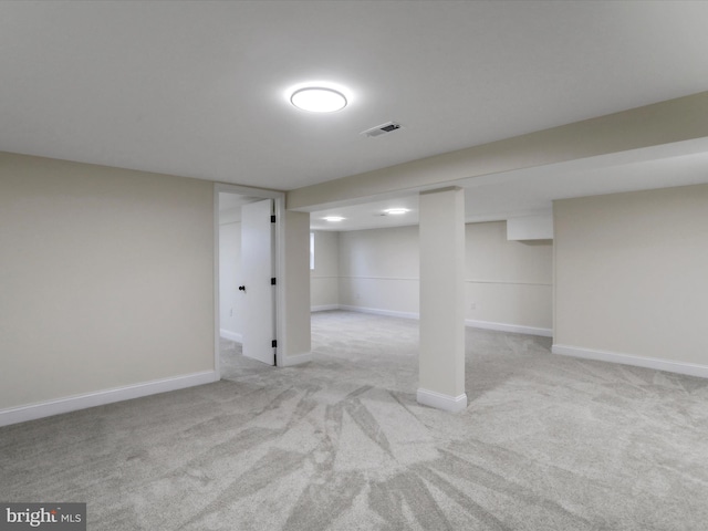 basement with light carpet