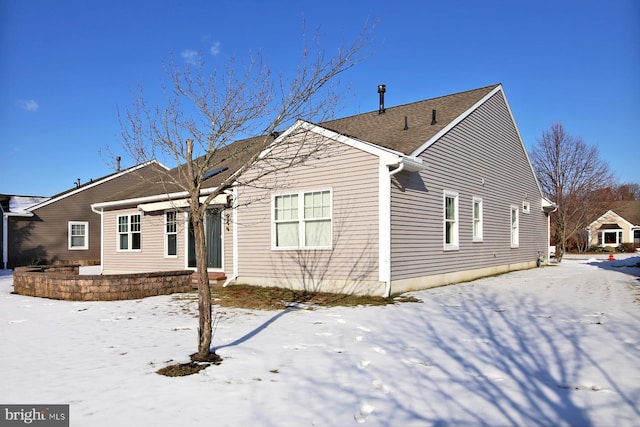 view of snow covered property