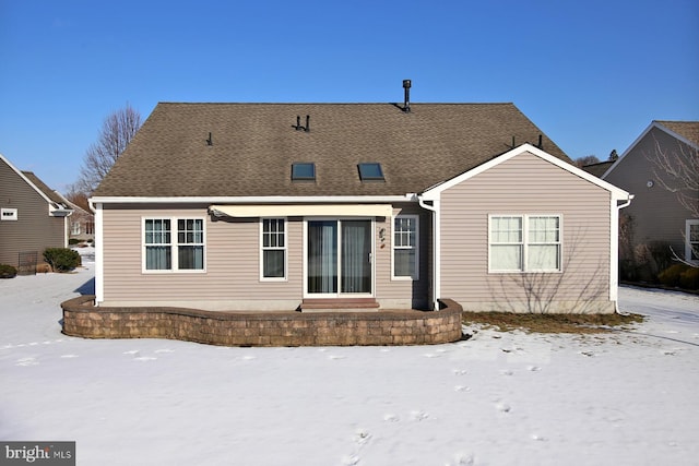 view of snow covered property