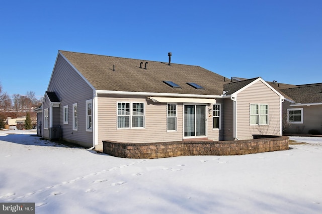 view of snow covered property