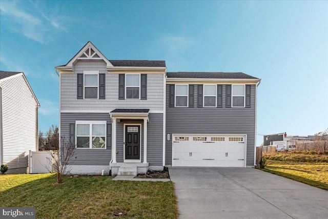 view of front of home with a garage and a front lawn