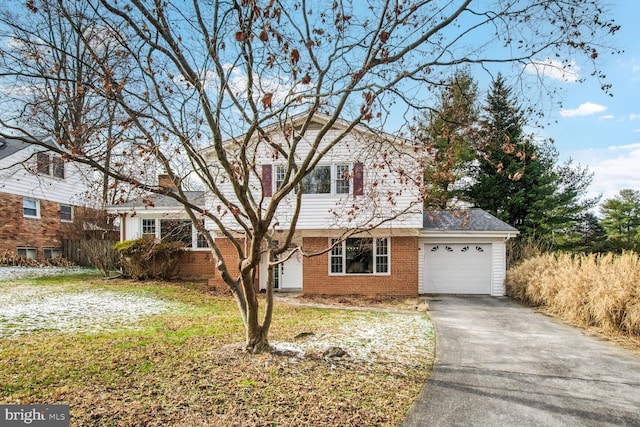 tri-level home featuring a garage