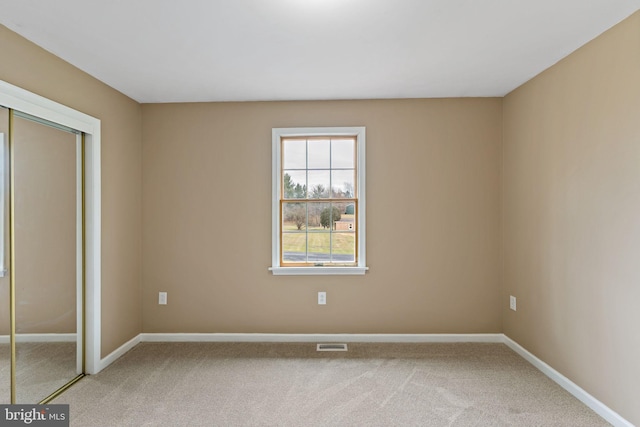 view of carpeted empty room