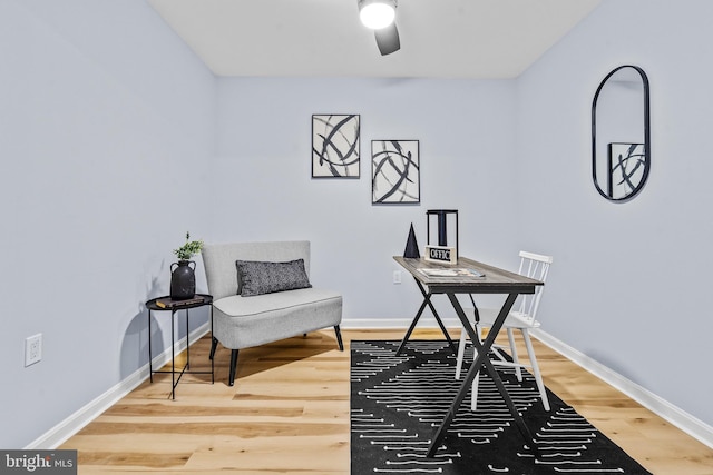 office area with ceiling fan and wood-type flooring