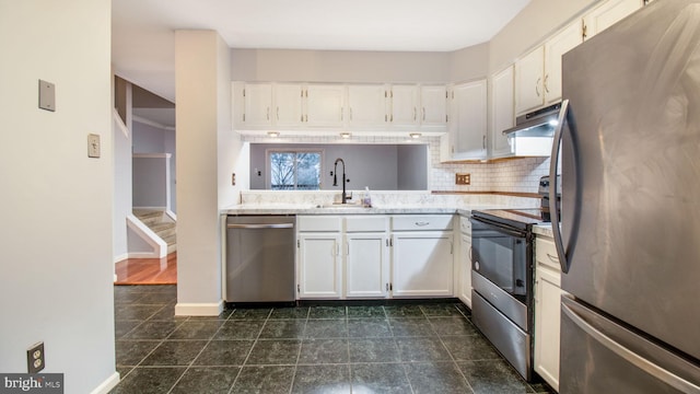 kitchen with white cabinets, backsplash, stainless steel appliances, and sink