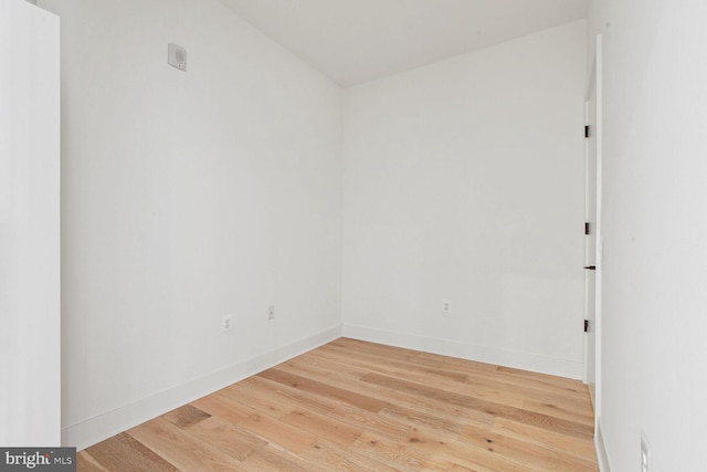 empty room with wood-type flooring