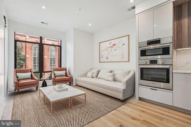 living room with light wood-type flooring