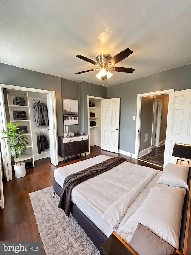 bedroom with ceiling fan, a closet, and dark hardwood / wood-style floors