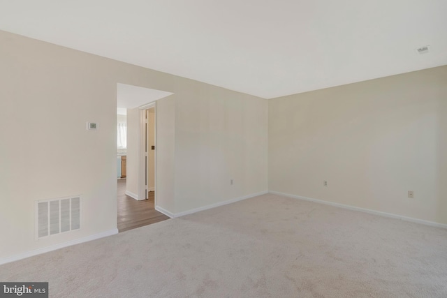 view of carpeted spare room