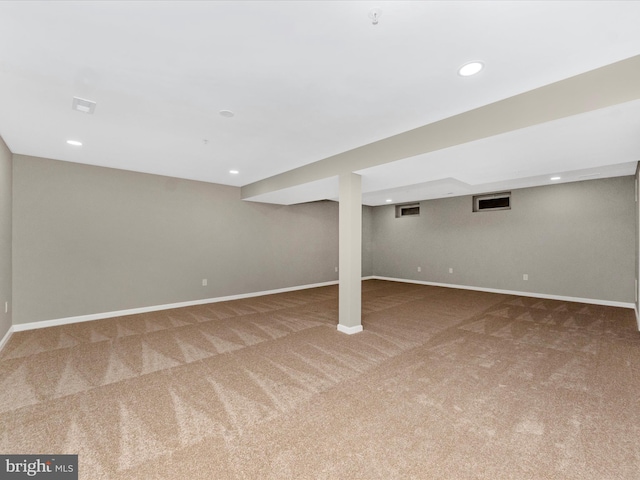 basement featuring carpet flooring