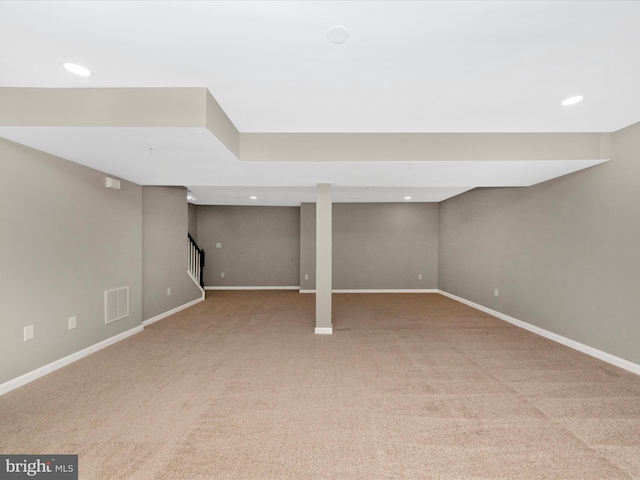 basement with carpet flooring