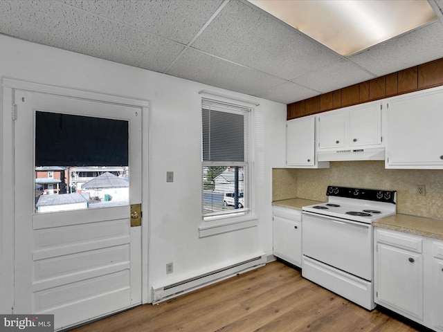 kitchen with white cabinetry, a drop ceiling, white electric range, a baseboard heating unit, and backsplash