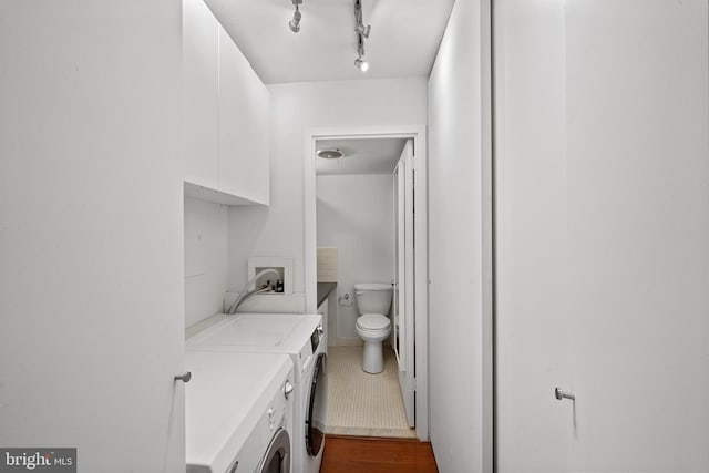 washroom featuring washer and dryer