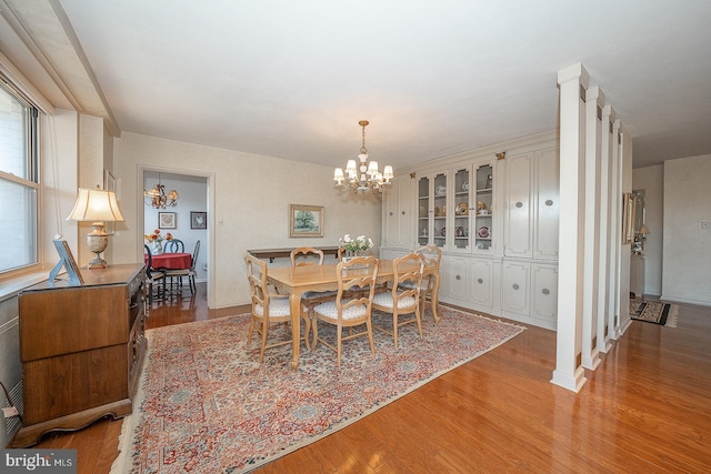 dining room featuring a chandelier and light wood-style floors