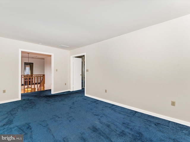 empty room featuring carpet floors