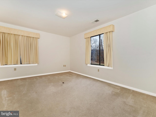 empty room with carpet floors