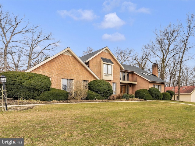 view of front of home with a front yard