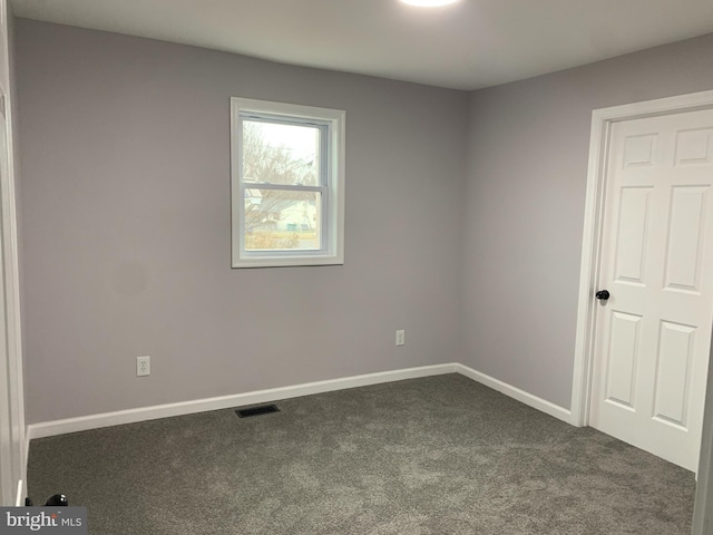 view of carpeted spare room